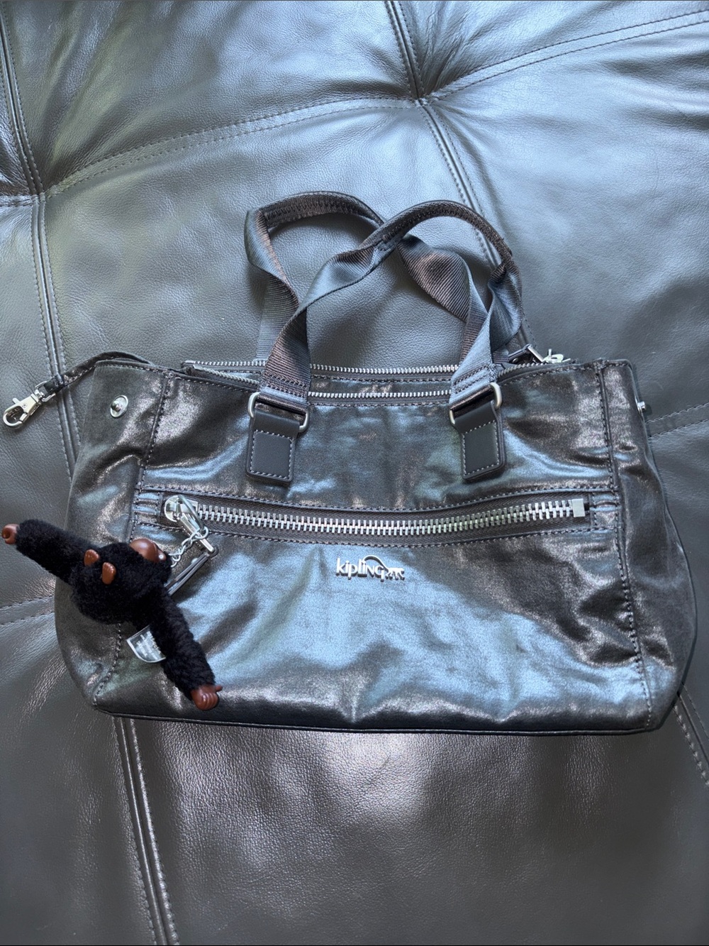 Kipling Metallic gray  purse with Monkey Keychain